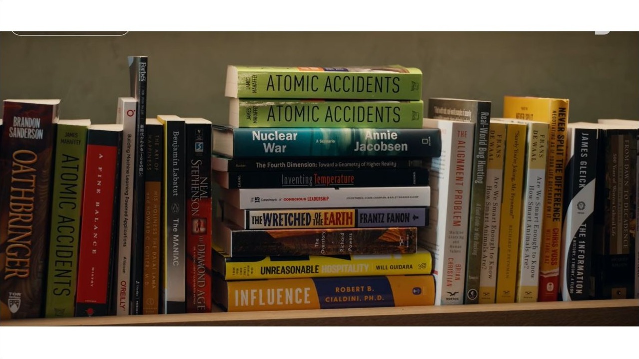 Cover graphic for Shelves of Loving Grace: Dario Amodei's Anthropic Bookshelf